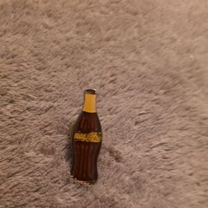 Coca-Cola Bottle Pin with Yellow and Brown Accents